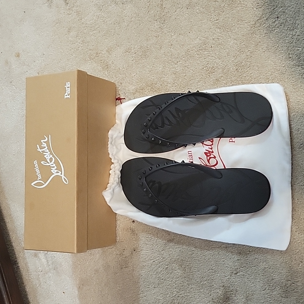 Louboutin spike flip flops